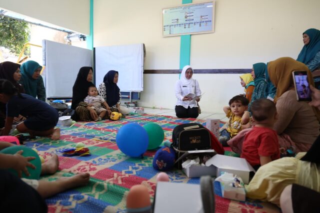Tinawati Andra Soni, Monitoring Pelaksanaan Enam SPM di Posyandu Katuk Kelurahan Pondok Jagung Timur